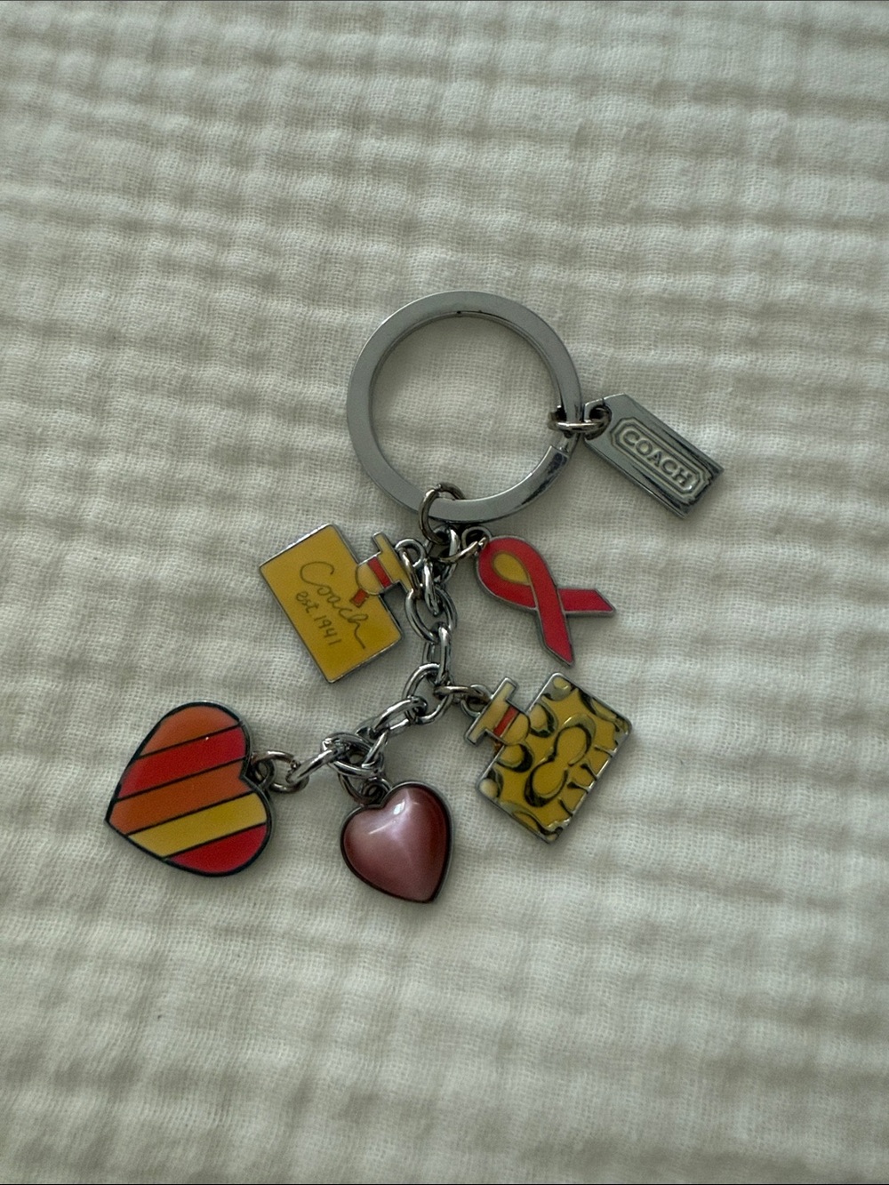 BNWOT Coach Silver-Tone Keyring with Pink & Yellow Multicharms